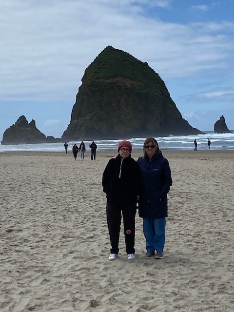 Photo of Ruth and I in front of Haystack Rock.