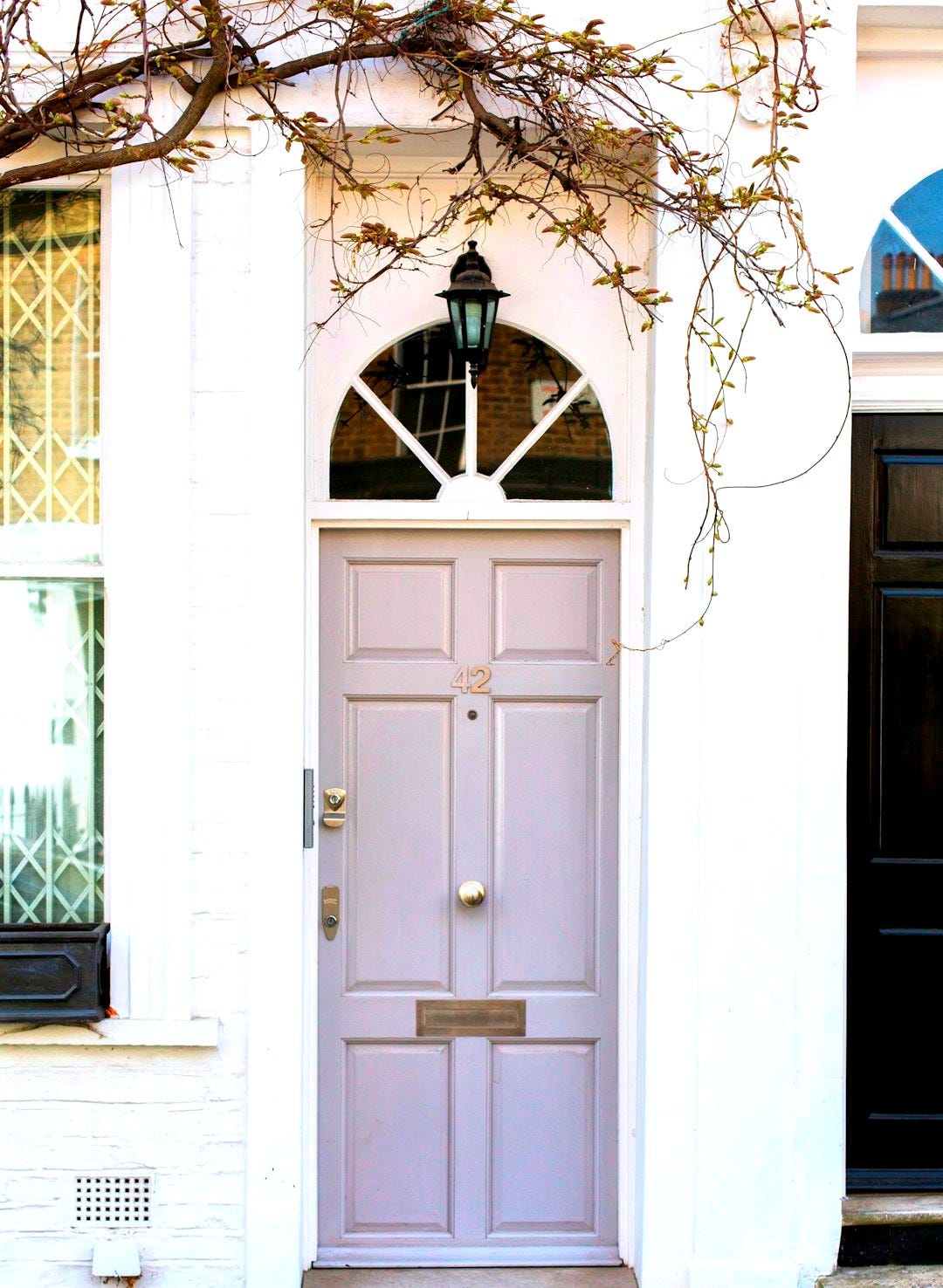 white wooden door mounted white wall