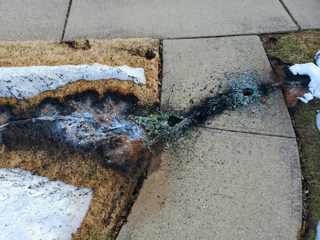 Live wire emitted such intense heat that a sidewalk melted and transformed the sand beneath to glass