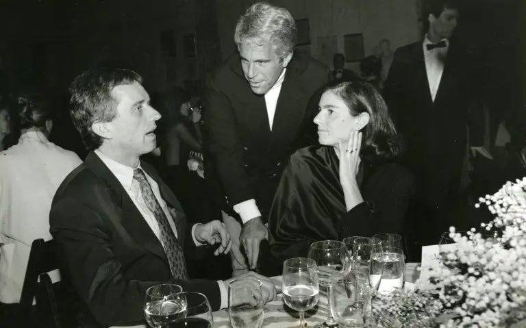 A 1993 photo of billionaire pedophile Jeffrey Epstein at dinner with Robert F. Kennedy, Jr