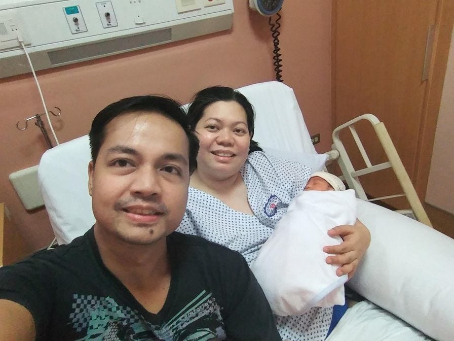 Mommy, Daddy, and baby Rafa in a private room in St. Luke's BGC