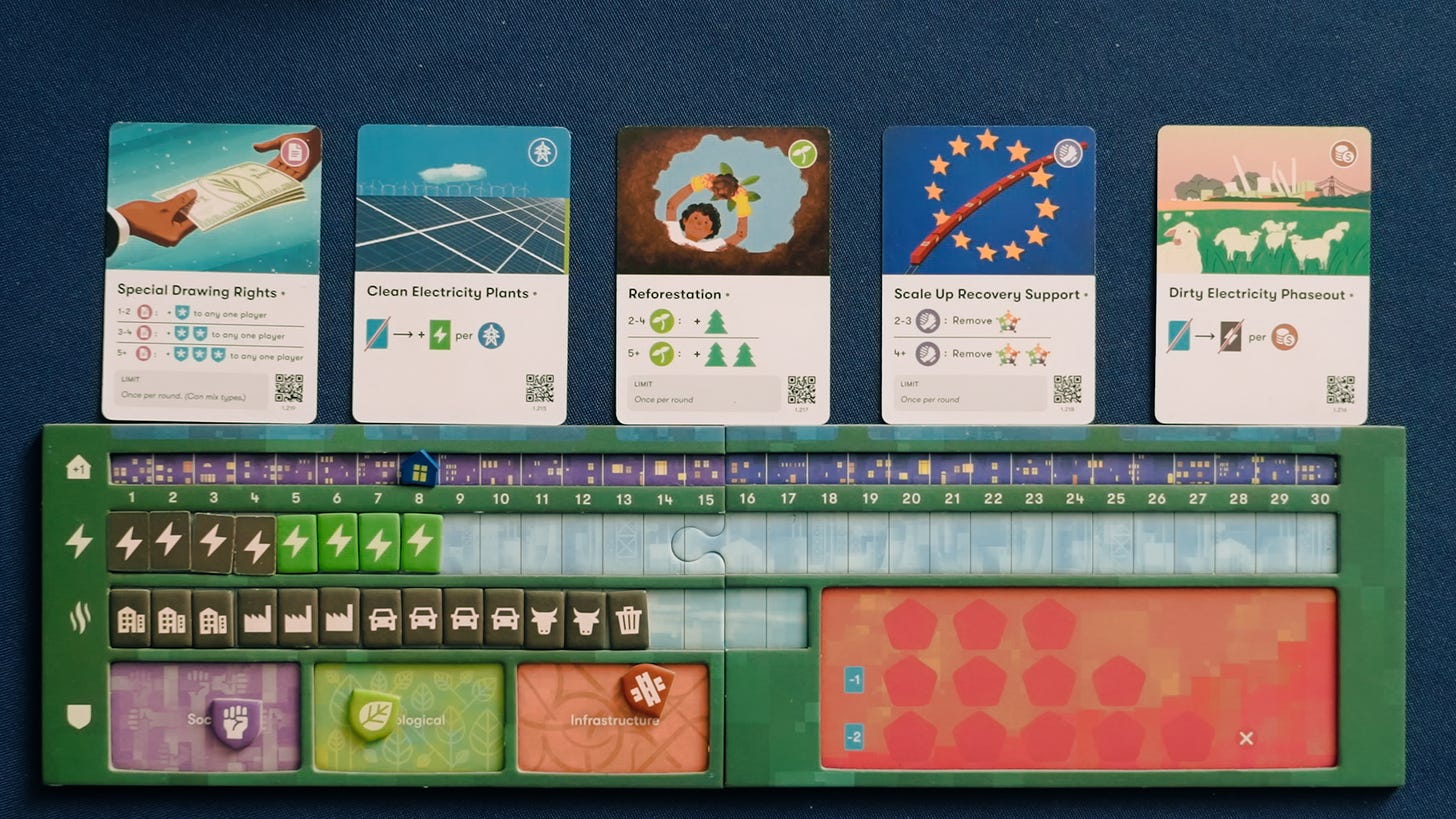 A player board and cards from the board game Daybreak. Photo copyright CMYK/Richard Reininger.