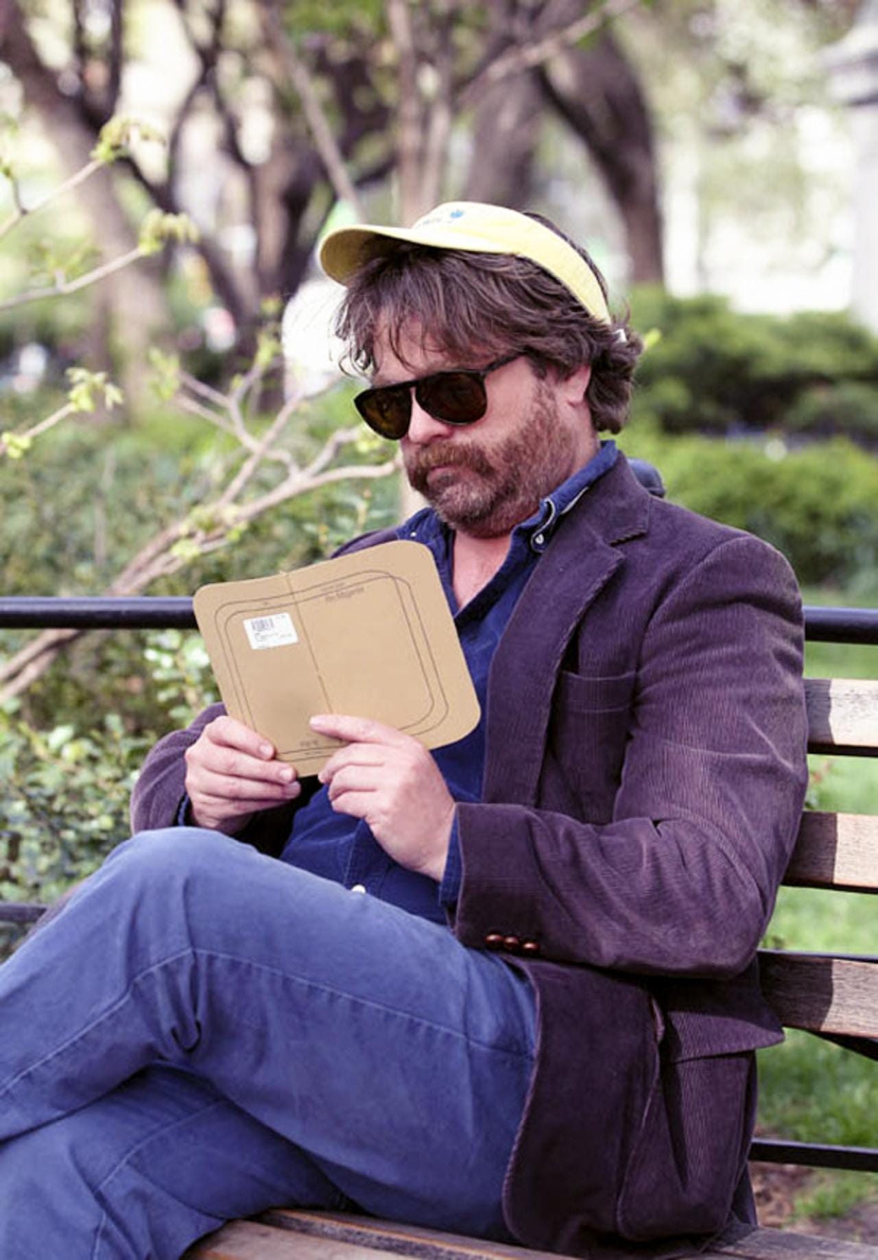 Actor and comedian Zach Galifianakis reads Corina Copp's "Pro Magenta" in Union Square Park. Zach was in the park to film a "Funny Or Die" spot.