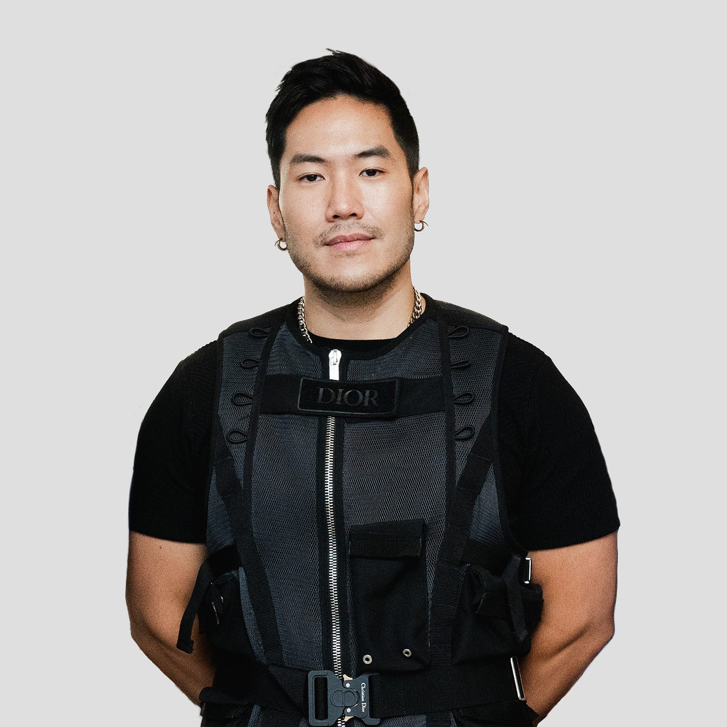 Tony Wang in black vest