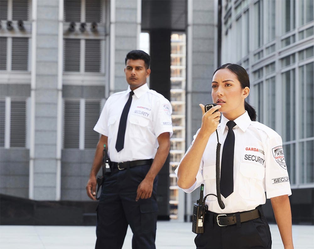 Two people in Garda World security outfits with ties. They look very stock footage and I’m happy for these workplace models, I hope they’re doing well. I got this from Garda World’s website which, as I said before, has the word “vigilance” on it an awful lot. 
