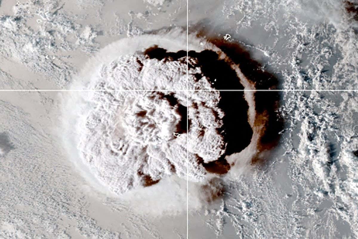 The eruption of an underwater volcano off Tonga, which triggered a tsunami warning for several South Pacific island nations, is seen in an image from the NOAA GOES-West satellite taken at 05:00 GMT January 15, 2022. CIRA/NOAA/Handout via REUTERS THIS IMAGE HAS BEEN SUPPLIED BY A THIRD PARTY. TPX IMAGES OF THE DAY - RC2MZR9YQ3WR