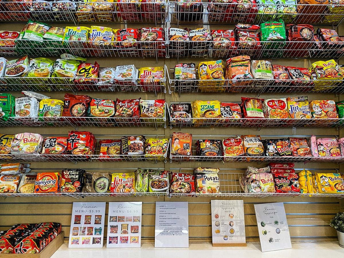 Wall shelving with dozens of ramyun options.