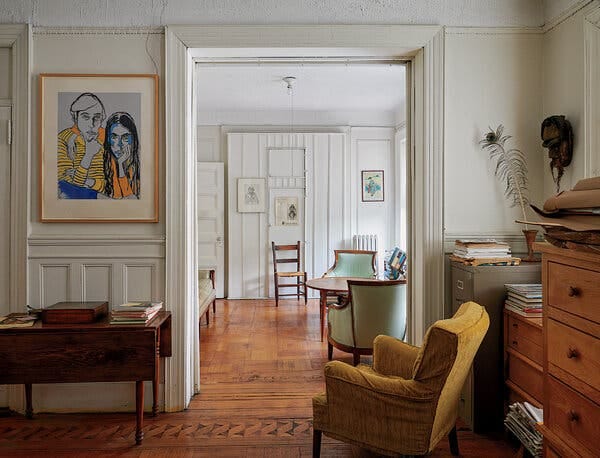 In the piano room of Alice Neel’s Upper West Side apartment hangs “Hartley and Ginny” (1970), a portrait of the artist’s son and his wife. Just beyond is the sitting room; its green and wooden chairs are featured in several of Neel’s works, including “Rosemary Frank” (1973) and “Ron Kajiwara” (1971), respectively.