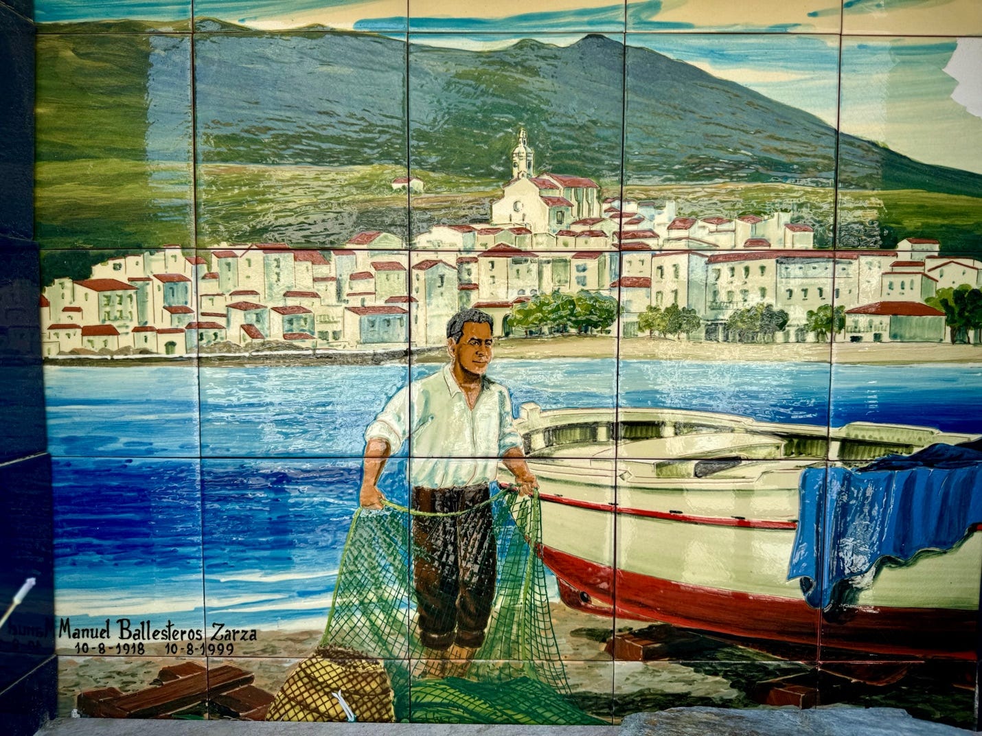 A mural of a person holding a fishing net

Description automatically generated