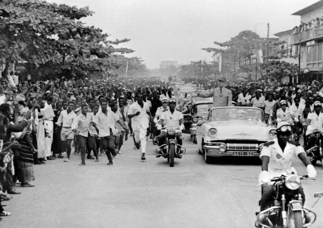 General Charles de Gaulle, President of the French Republic, greets the crowd on August 26, 1958, in Abidjan, during his official visit to Côte d'Ivoire, two years before the accession of this French colony to independence.