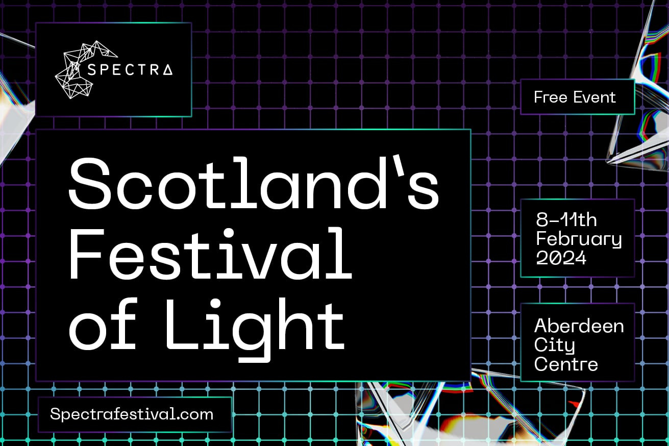 This image is a promotional poster for Spectra Festival 2024, billed as "Scotland's Festival of Light," which is scheduled to take place from 8th to 11th February 2024 in Aberdeen City Centre. The poster features a contemporary design with a dark background accented by a grid and colorful light refractions, emphasizing the light-based nature of the festival. The event is advertised as a free event, making it accessible to a wide audience. The website for the festival is also provided for those seeking more information. The design of the poster is modern and vibrant, capturing the essence of a festival that celebrates light in various artistic forms.