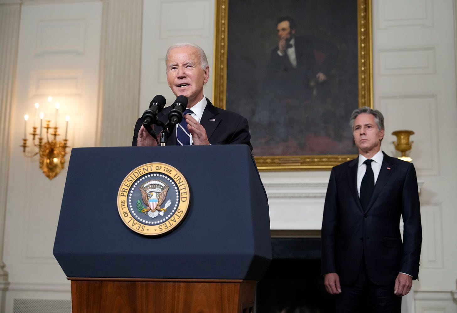 “An act of sheer evil.” President Biden, joined by Secretary of State Blinken, responded to Hamas’ attacks on Israel in a speech on Oct. 10. Image Credit: Drew Angerer/Getty Images