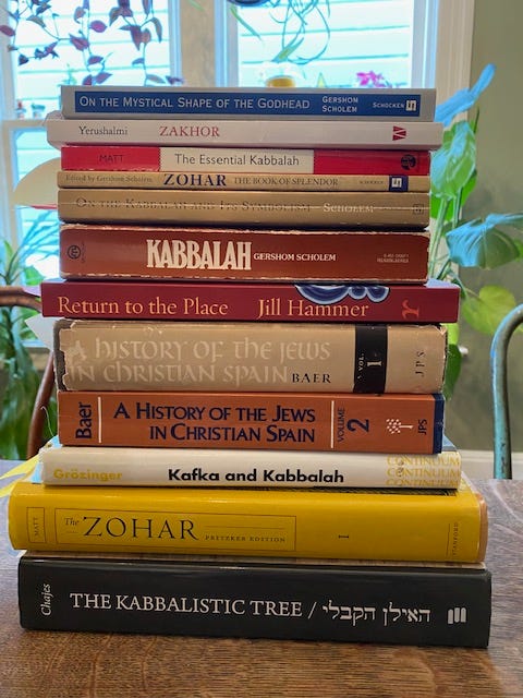 Stack of assorted books about Kabbalah and the history of Jews in Spain