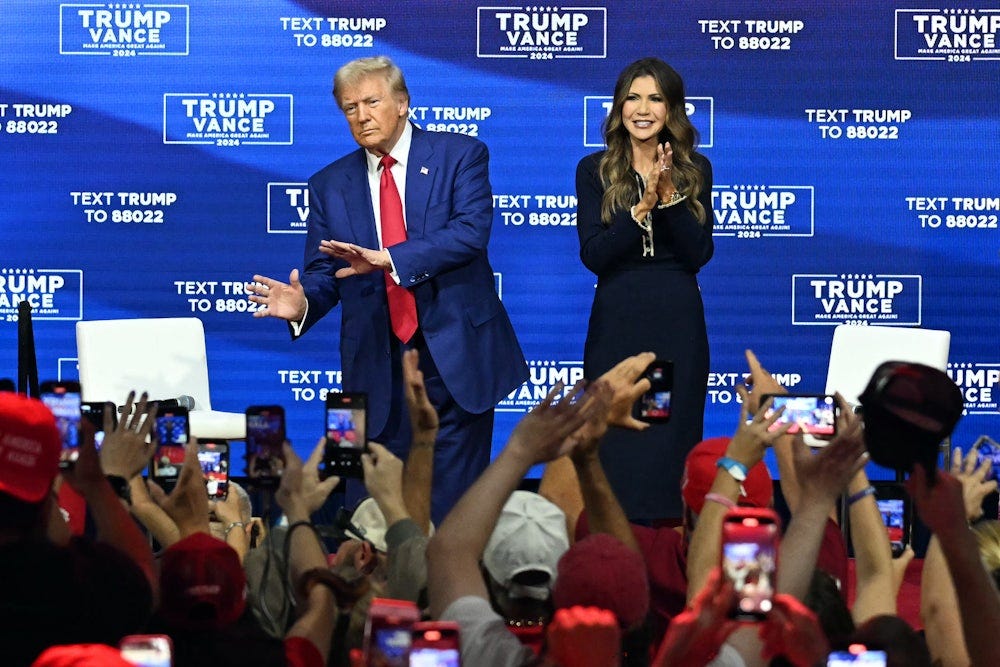 Trump with South Dakota Governor Kristi Noem at a town hall in Oaks, Pennsylvania