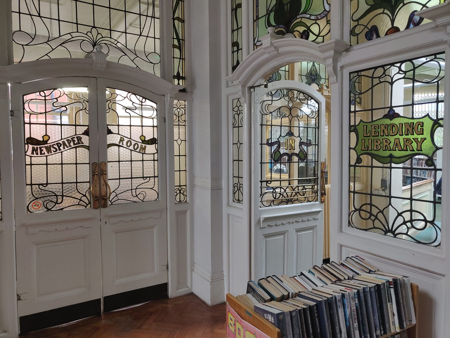 Glass partitions inside Fratton Carnegie library in the UK.