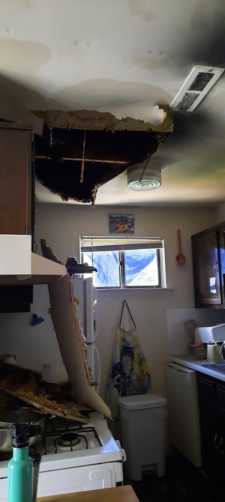 Hole in the ceiling and ceiling on the stove