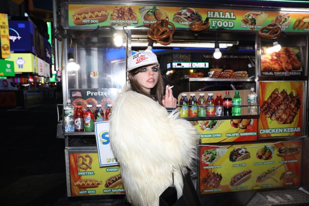 Meg Superstar Princess smoking at a food cart