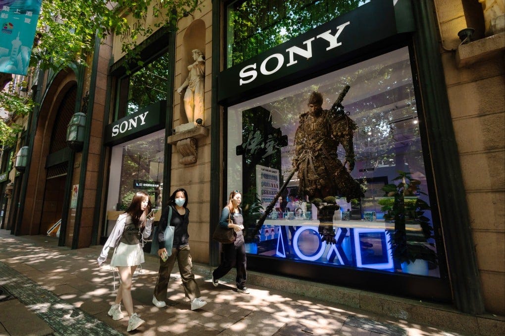 People pass by an ad for the video game ‘Black Myth: Wukong’ in the Sony store in Shanghai, August 26, 2024. Photo: EPA-EFE