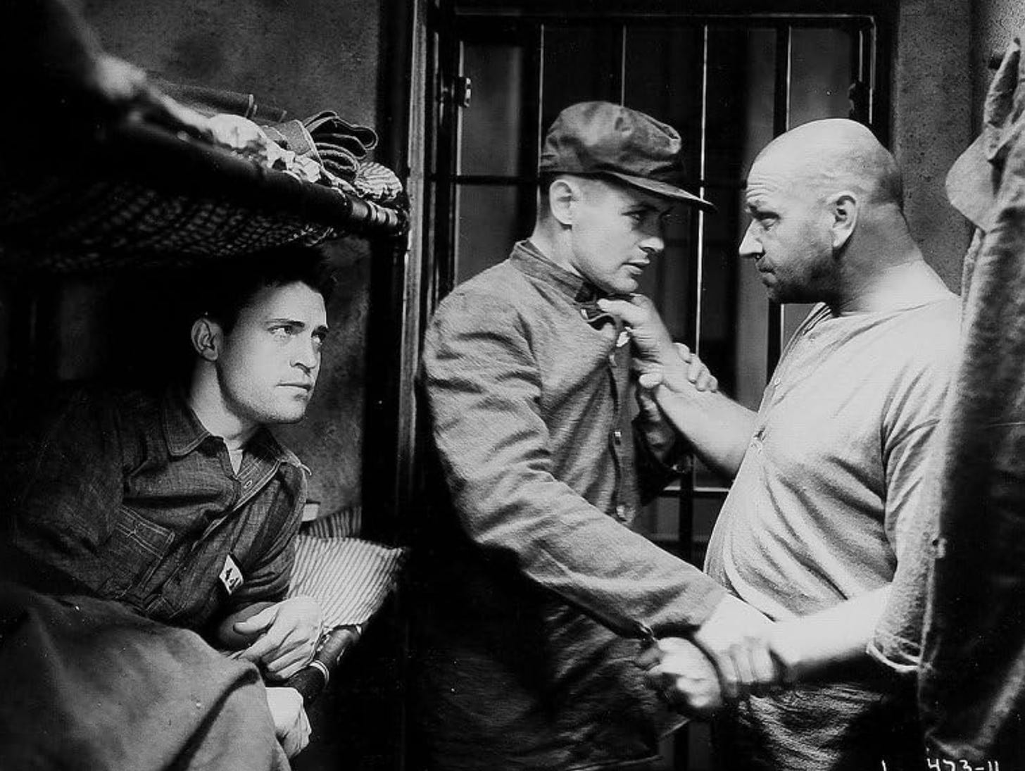 Chester Morris, Robert Montgomery, & Wallace Beery in a scene from The Big House