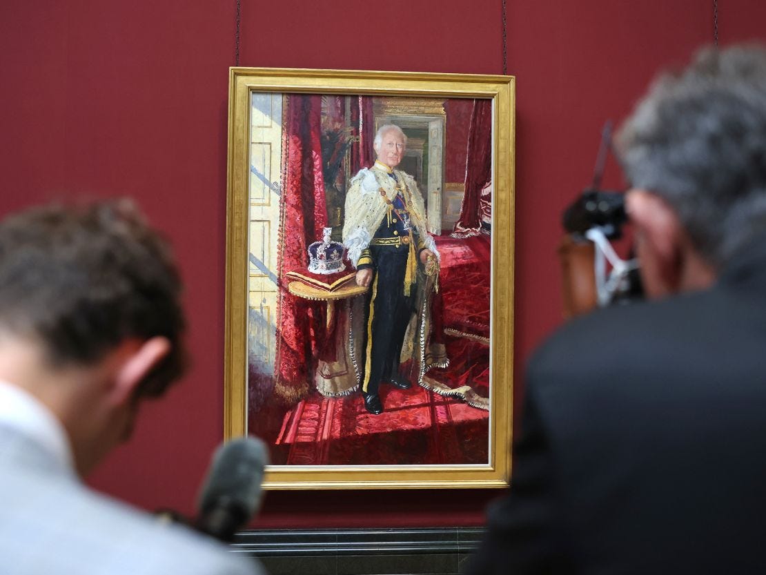 The King's portrait was created by English figurative painter Peter Kuhfeld.