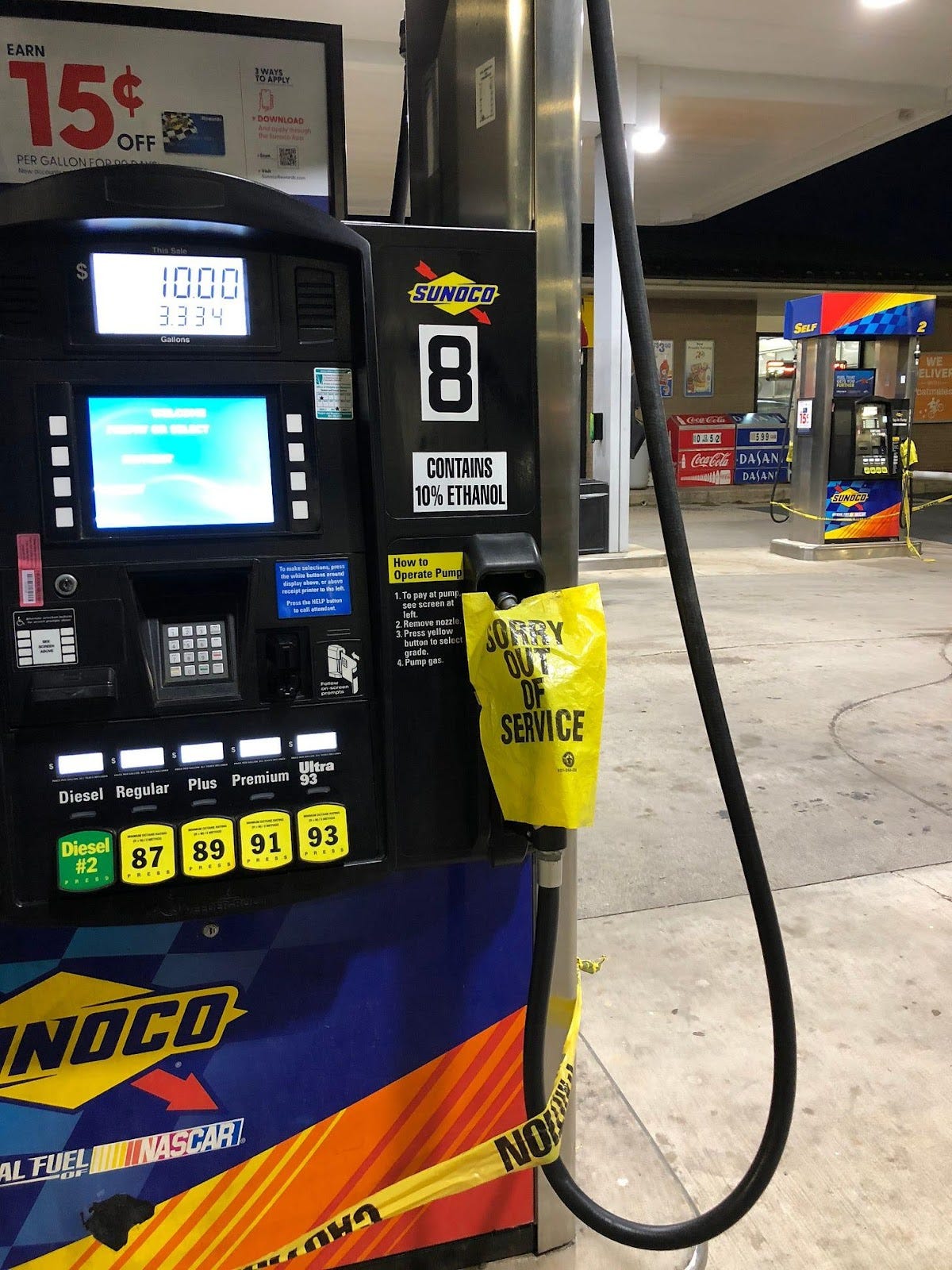 A gas pump with a number on it

Description automatically generated