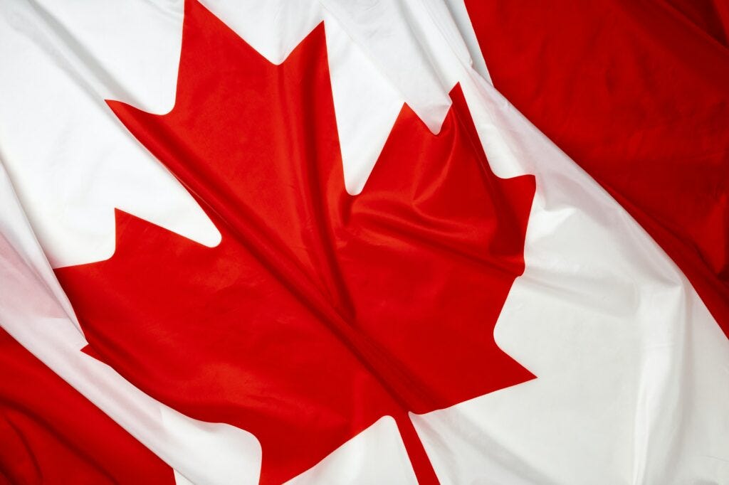 Rippled textile flag of Canada close up