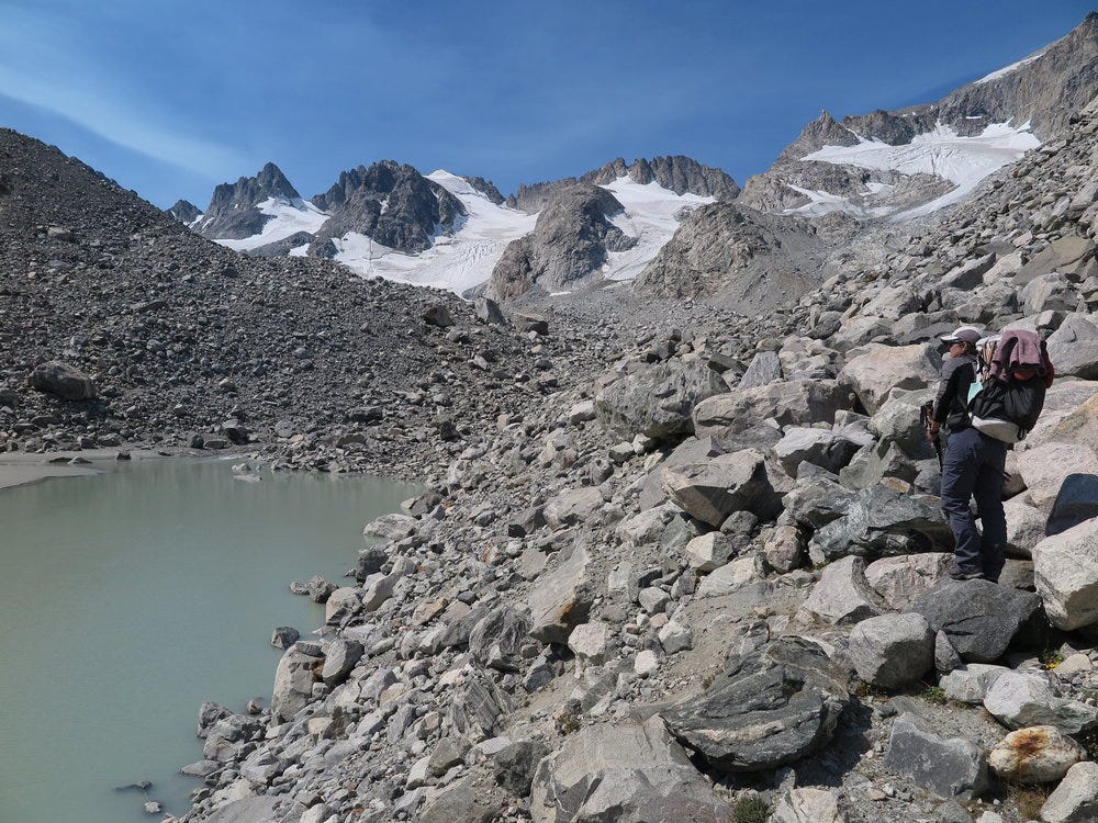 Earlier in the trip, hiking through glacial moraines after West Sentinel Pass. 