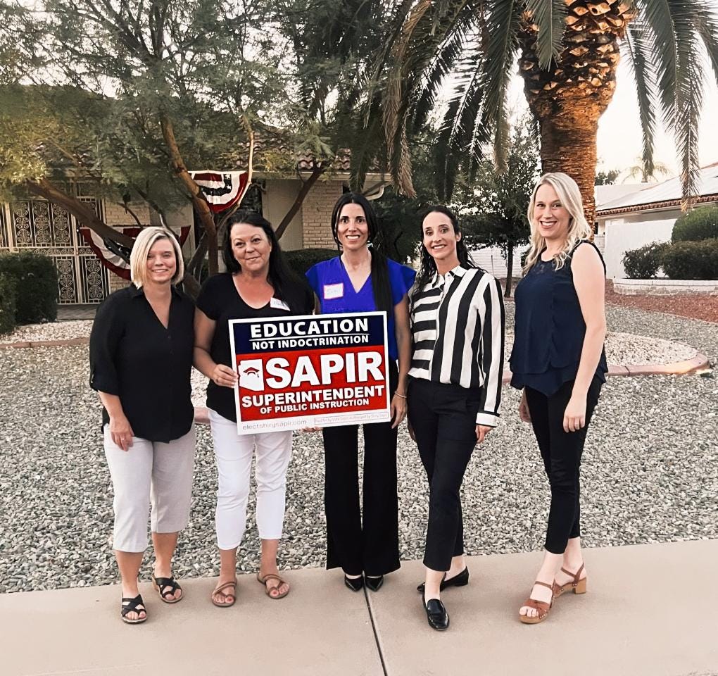 group of women holding campaign sign for Sapir for Superintendent