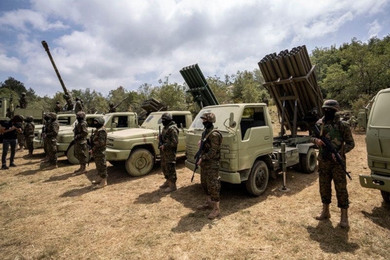 Fighters from the Lebanese Hezbollah carry out a training exercise in Aaramta village in the Jezzine District, southern Lebanon, May 21, 2023 (AP)