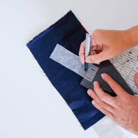 drawing stitch and cutting lines on interfacing