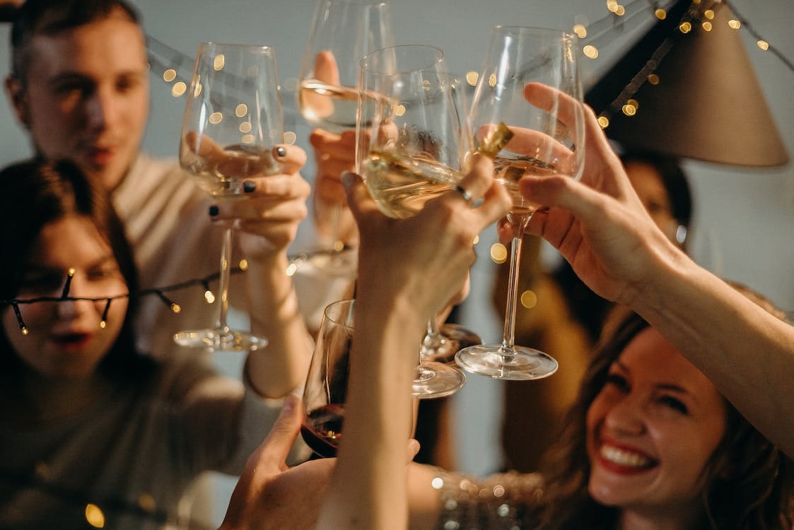 Free Selective Focus Photography of Several People Cheering Wine Glasses Stock Photo