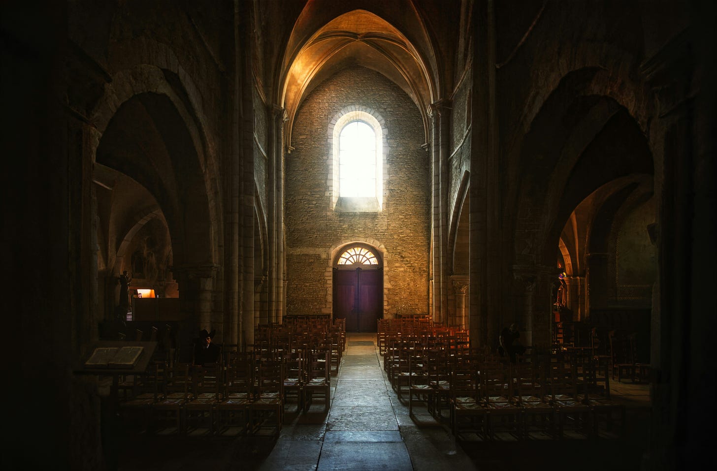 Image of the interior of an old high-ceiling church.