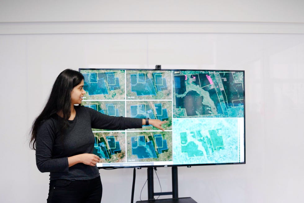 BeZero Remote Sensing Scientist Saheba Bhatnagar presenting project analysis on a large screen
