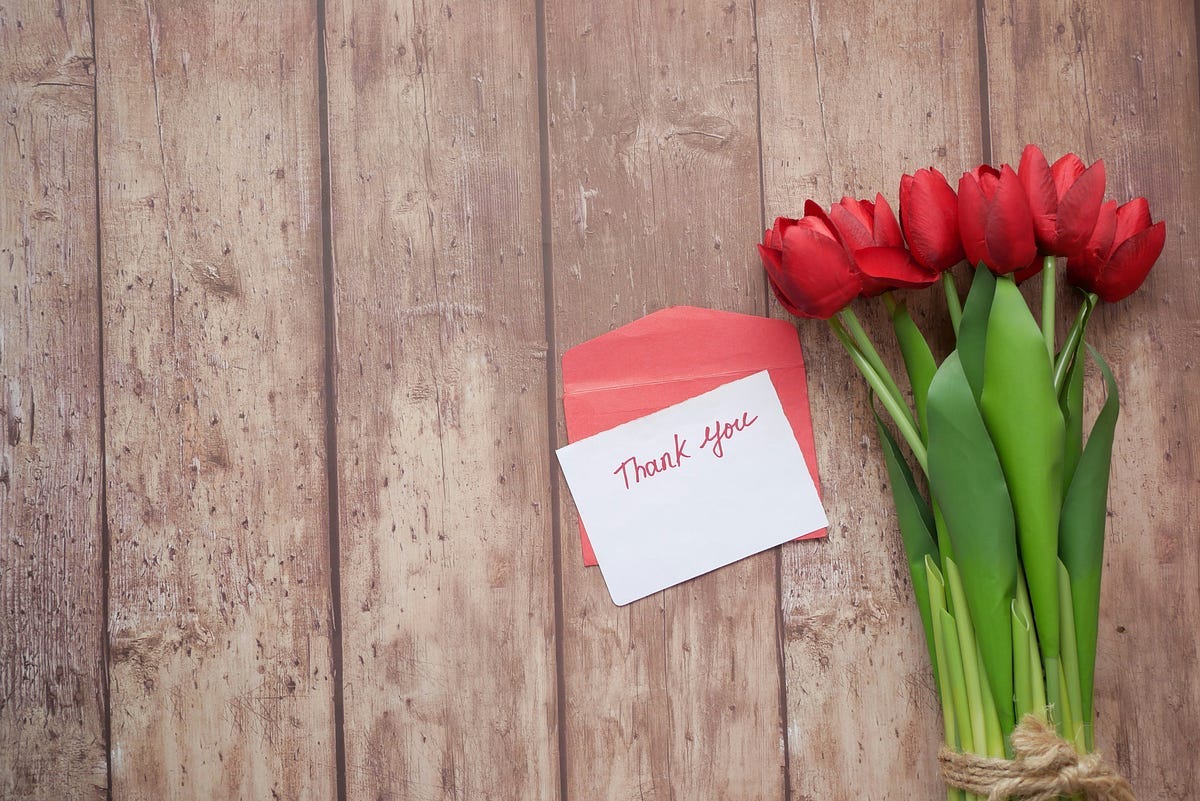 A “Thank you” note with flowers. A “Thank you” note with flowers.