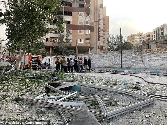 TEHRAN, IRAN - JUNE 13: A view of a damaged building in the Iranian capital, Tehran, following an attack, on June 13, 2025. Firefighting teams are dispatched to the area. Israeli Defense Minister Israel Katz has announced that Israel conducted strikes on Iran. (Photo by Fatemeh Bahrami/Anadolu via Getty Images)