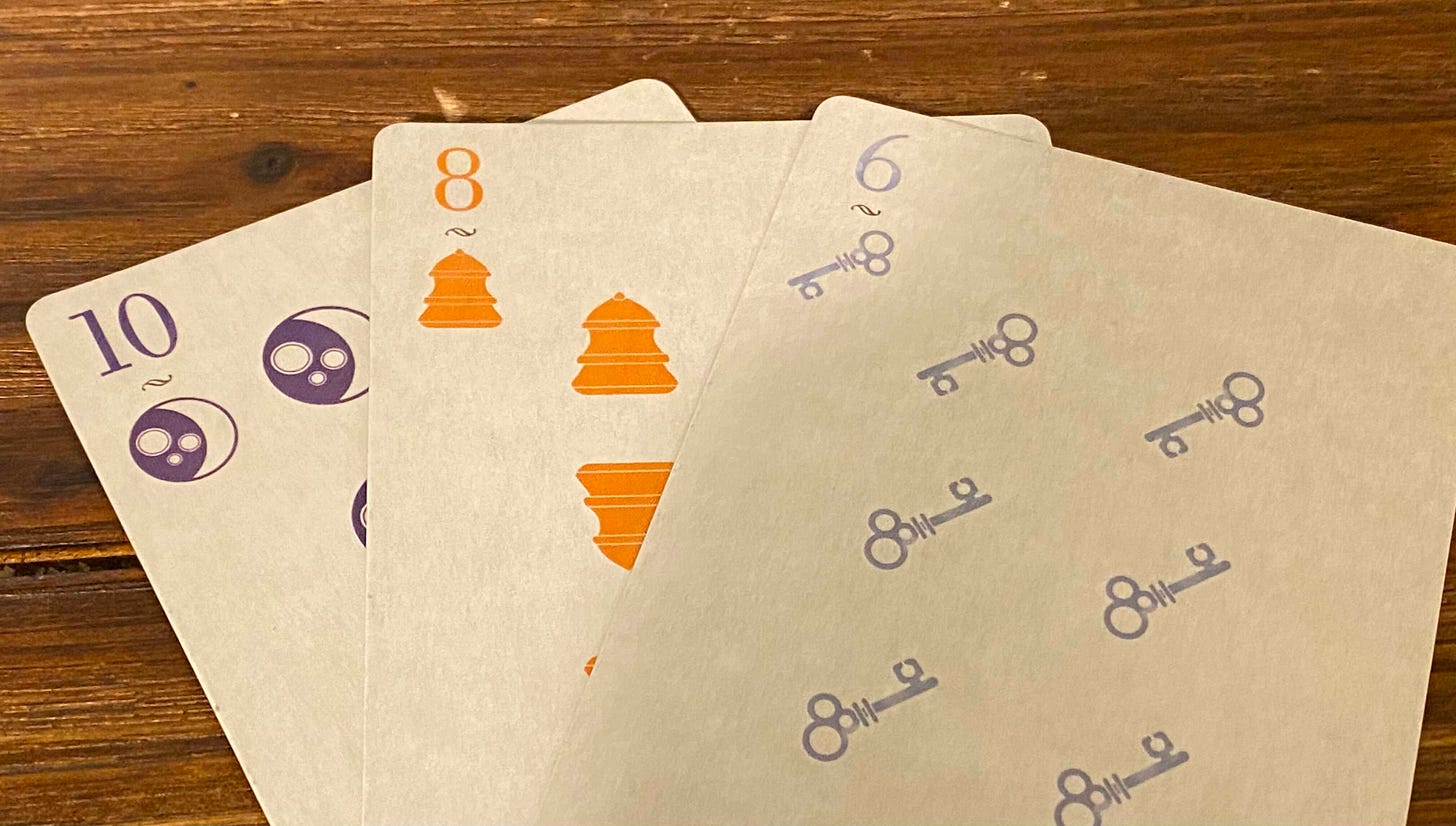 The "normal" cards From left to right, the moon 10, bell 8, and key 6