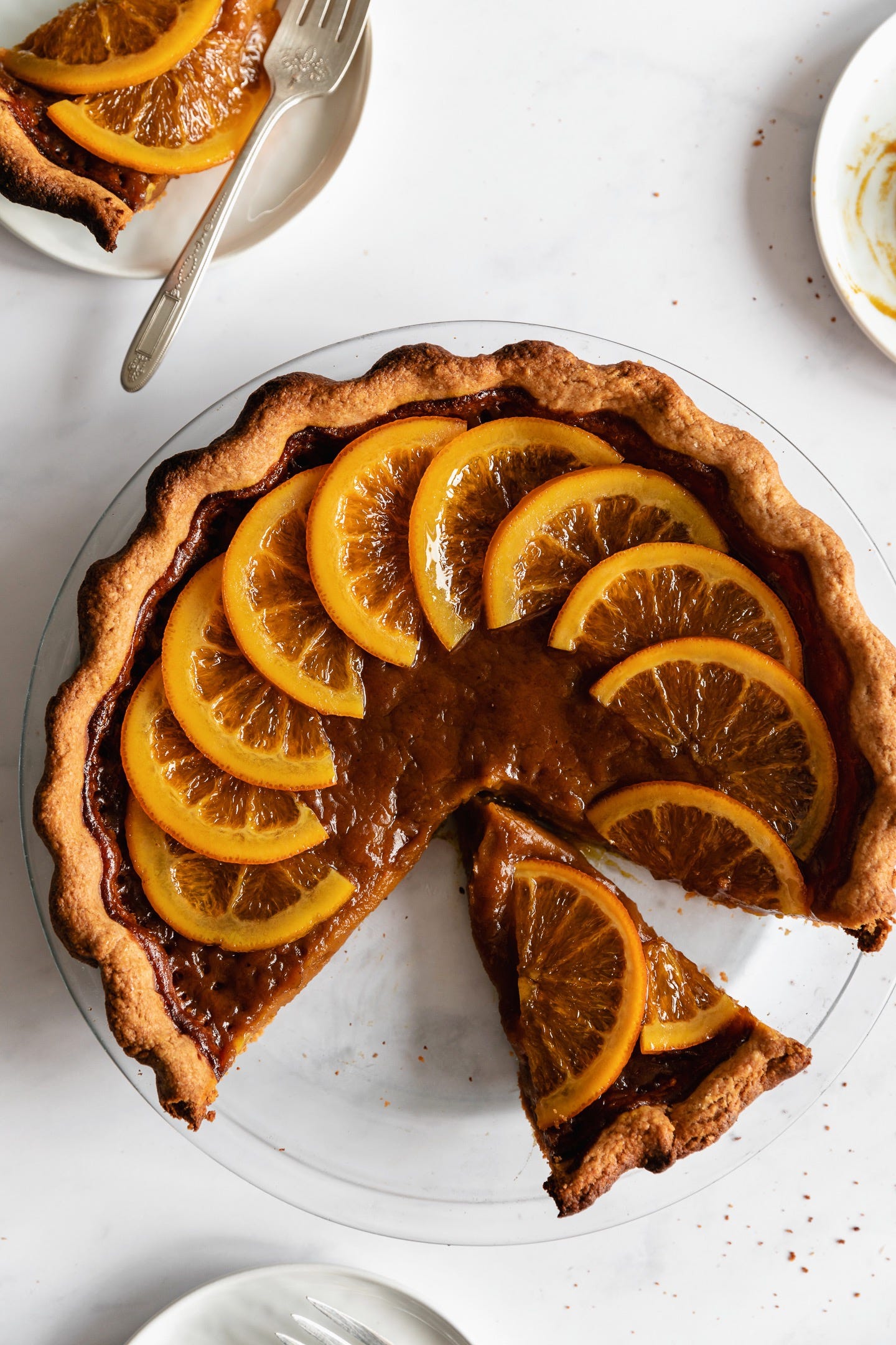 Vegan candied orange pumpkin pie slice