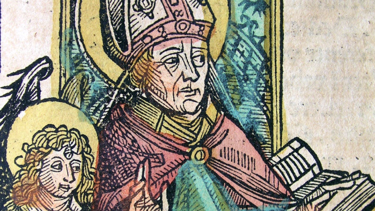 A hand-colored woodcut illustration of Saint Augustine, shown wearing a bishop’s mitre and robes, with a halo behind his head. He holds a book in one hand and gestures with the other, symbolizing his role as a theologian and teacher. A small winged figure, possibly an angel or symbolic representation of divine inspiration, appears beside him. The style is medieval, with bold outlines and limited color palette, characteristic of early printed devotional images. A hand-colored woodcut illustration of Saint Augustine, shown wearing a bishop’s mitre and robes, with a halo behind his head. He holds a book in one hand and gestures with the other, symbolizing his role as a theologian and teacher. A small winged figure, possibly an angel or symbolic representation of divine inspiration, appears beside him. The style is medieval, with bold outlines and limited color palette, characteristic of early printed devotional images.