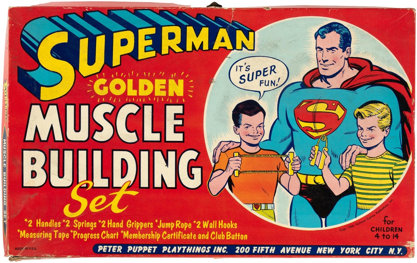 Hake's - SUPERMAN GOLDEN MUSCLE BUILDING SET.