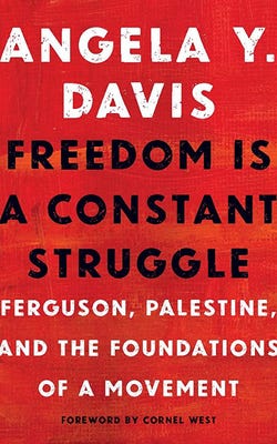 Book cover for Freedom is a Constant Struggle by Angela Y. Davis with the title in black font and the author's name and the book's subtitle in white font over a texture red backdrop