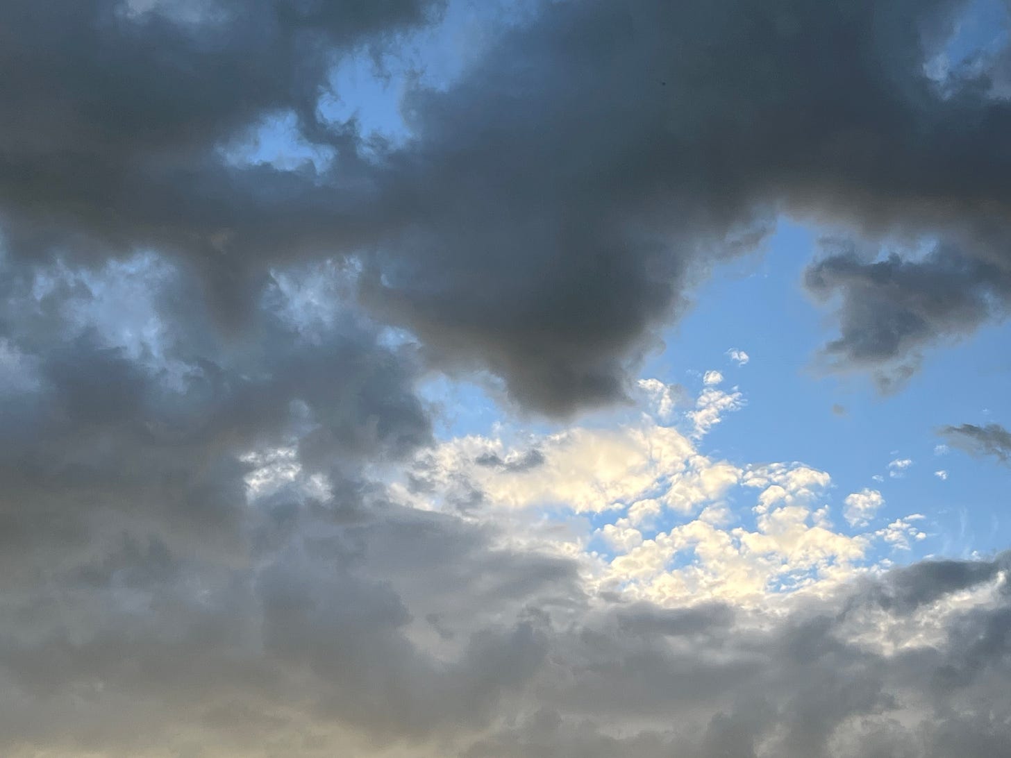 Contrast increases and cloud colours shift as sunset approaches 