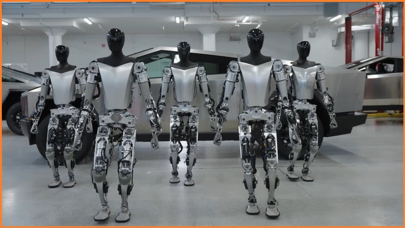 five Tesla robots in front of a Cybertruck