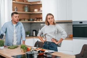 Arguing with each other. Couple preparing food at home on the modern  kitchen 15412356 Stock Photo at Vecteezy