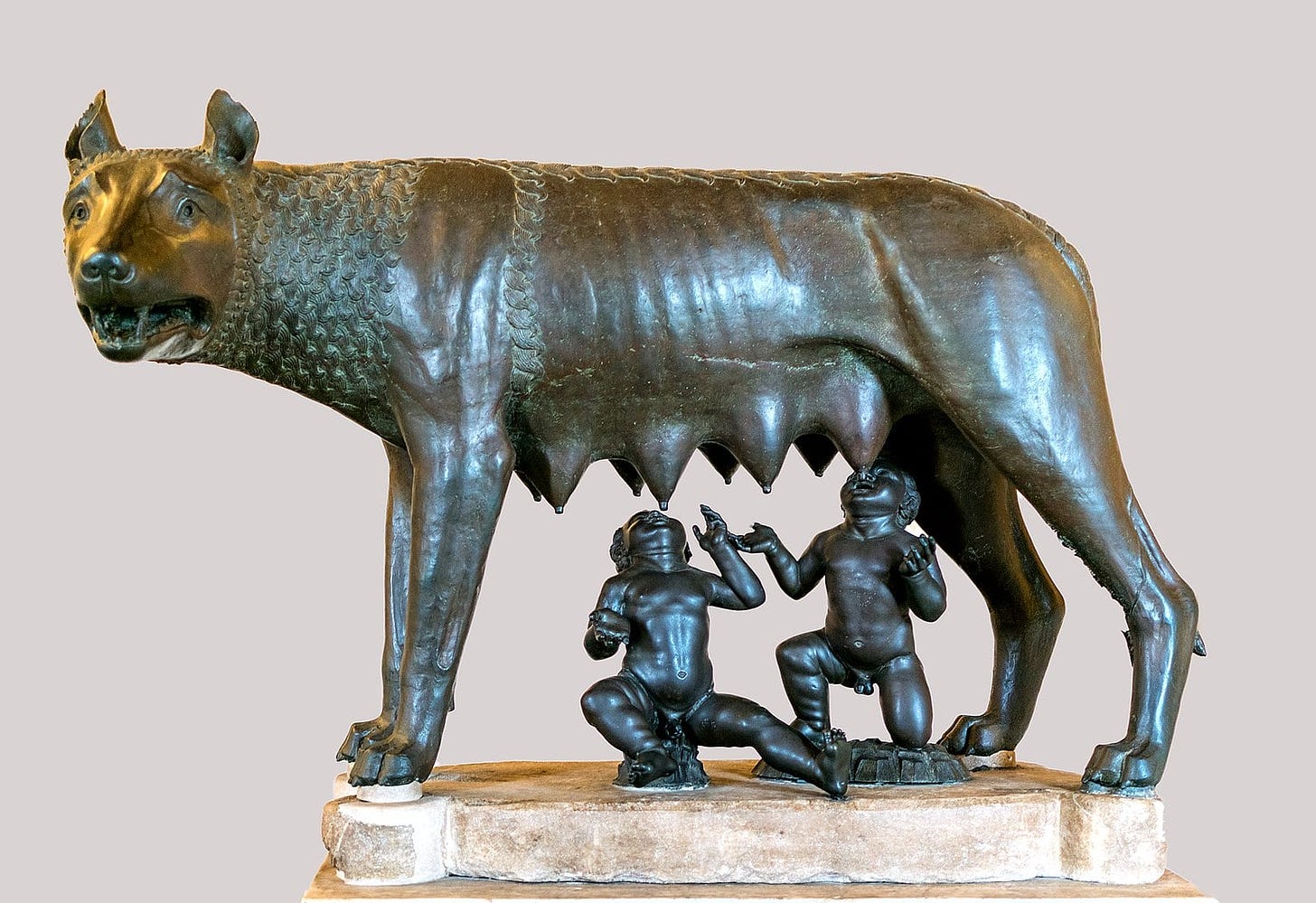 "Capitoline Wolf": Romulus and Remus suckling their wolf foster mother ...
