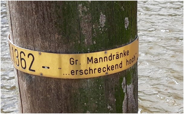 A sign commemorating the Manndränke flood of 1362.