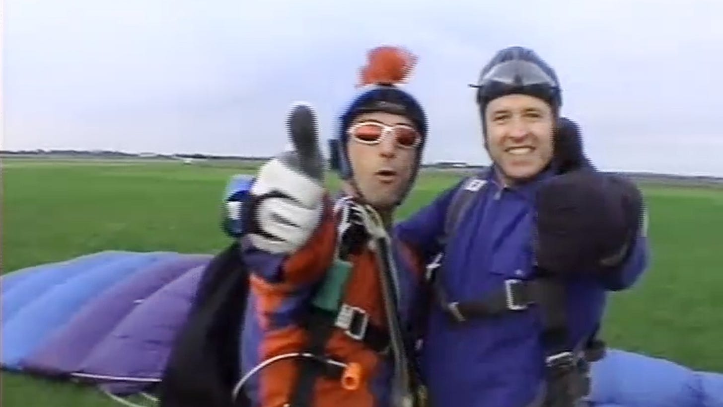 Picture of Paul and Skydive instructor giving the thumbs up after landing safely