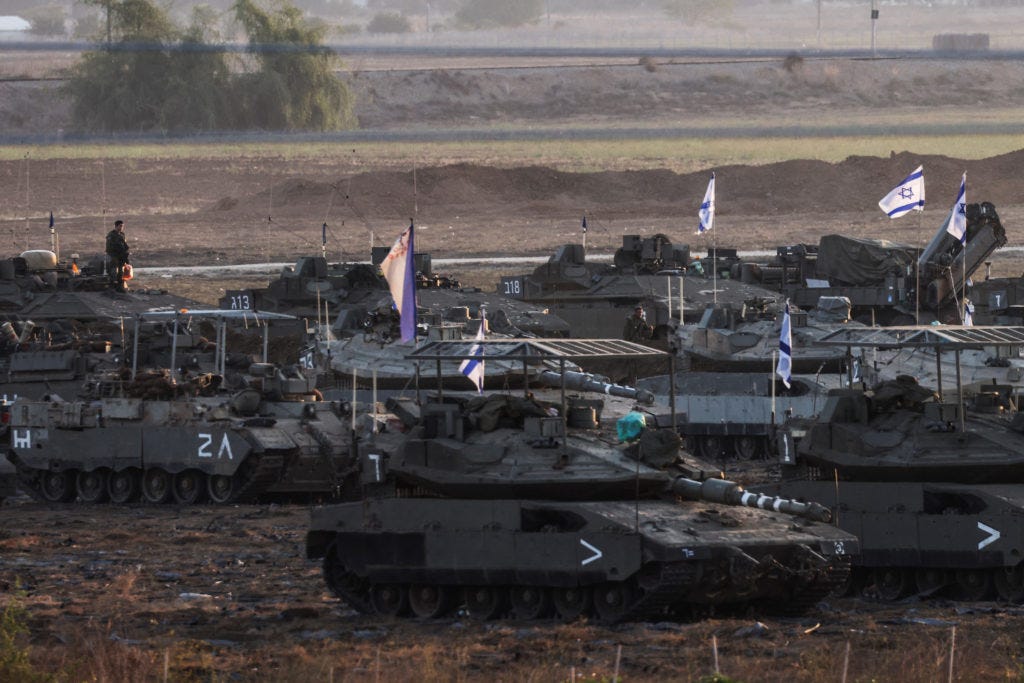 Israel tells troops to 'be ready' for ground invasion while Gaza holds out  for humanitarian aid | PBS NewsHour