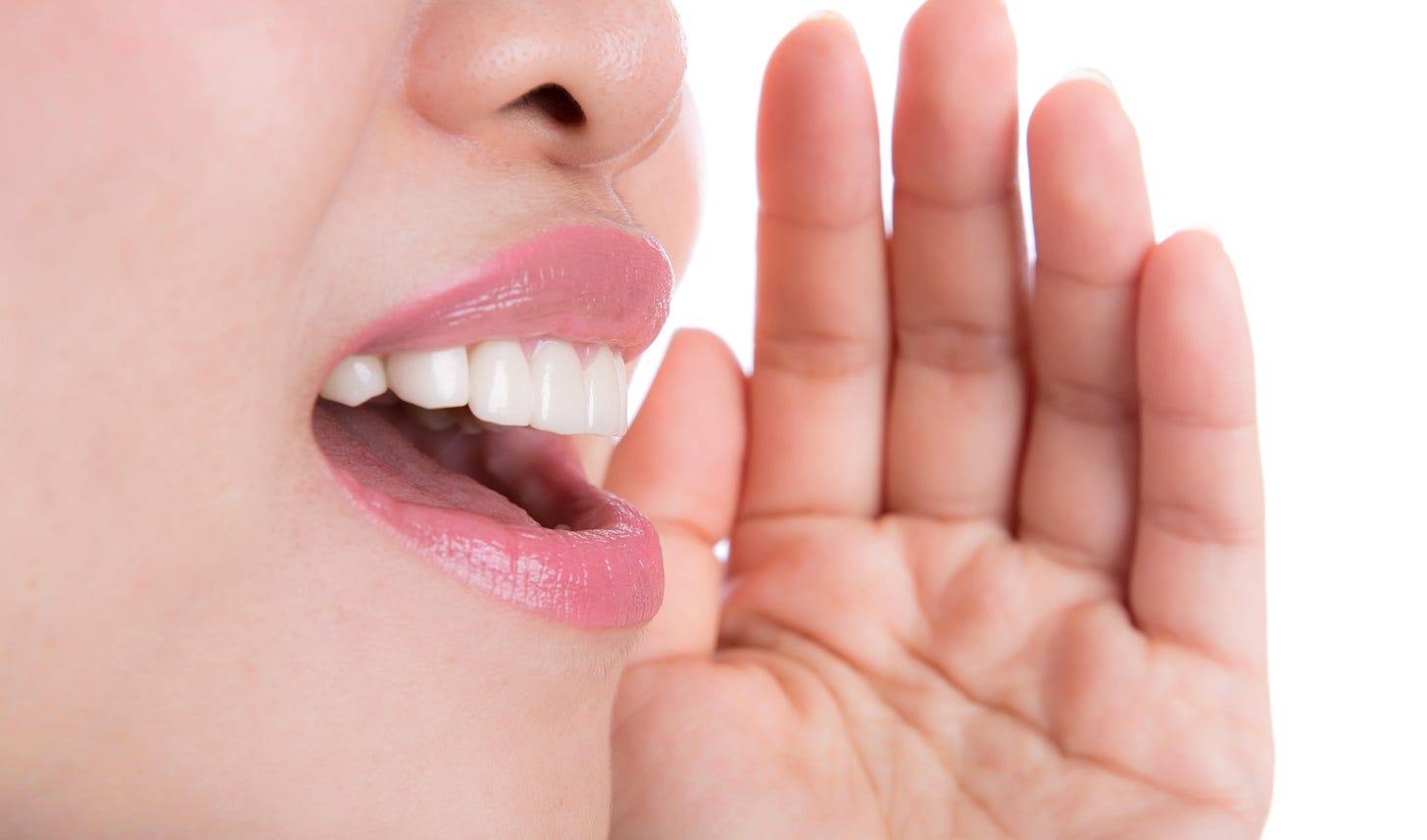 Close up of young woman shouting something