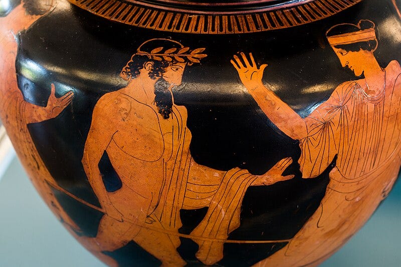 color photograph of a red figure vase showing Zeus with sceptre pursuing a woman, another woman fleeing 
