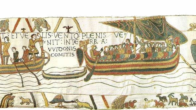 Image of a section of tapestry showing Norman ships